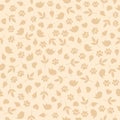 Seamless pattern with small simple birds,hearts,branches,leaves and paws on a warm beige background